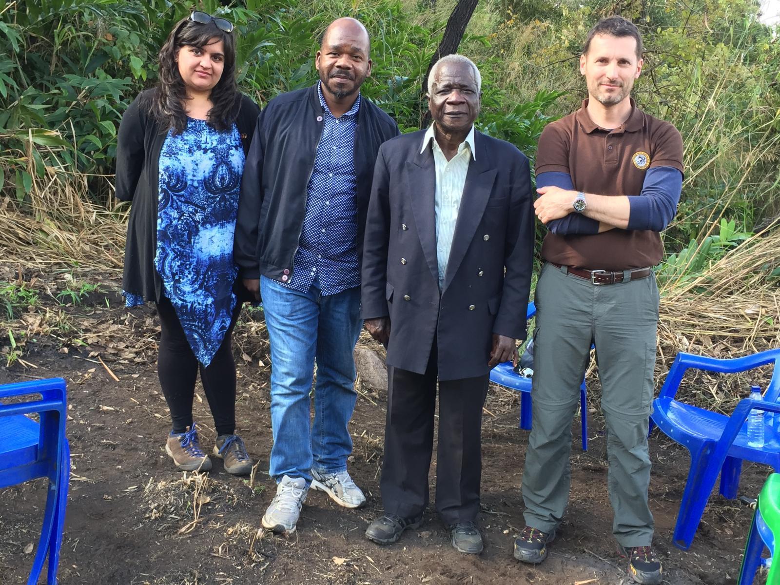 Ambassador Mirko Manzoni, Neha Sanghrajka and Eduardo Namburete with the leader of Renamo, the late Afonso Dhlakama, at Renamo headquarters, Vunduzi, Sofala province.