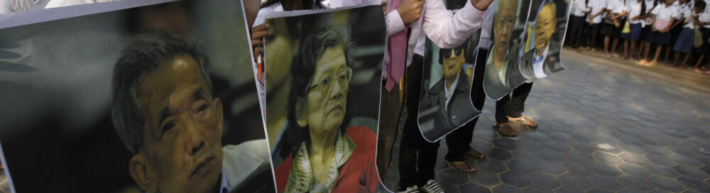 Court officer of the Khmer Rouge Tribunal speaks with students during a public forum in Phnom Penh.