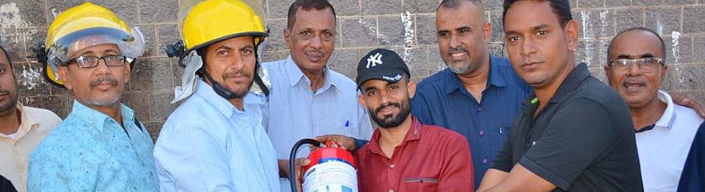 Members of the Community Safety Committee in Aden are handing over firefighting kits to selected neighborhoods in the Sirah district as part of their second initiative.