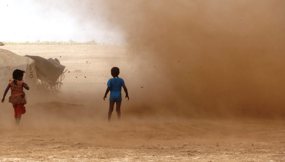 Children in dust storm in Ethiopia.