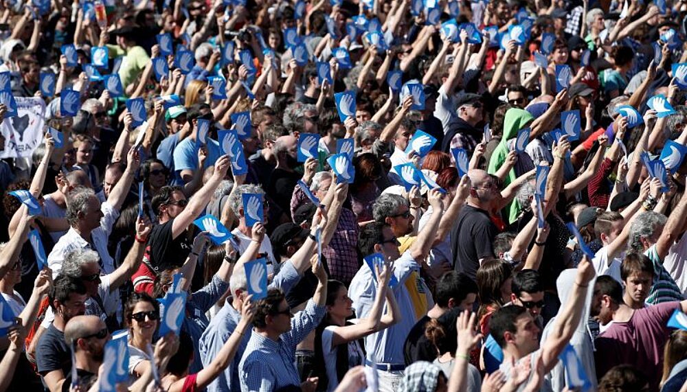 Thousands attended demonstrations in the Basque country in 2017 holding up signs of the activists group “Artisans Of Peace” who worked as peace brokers during the process of ETA’s disarmament.