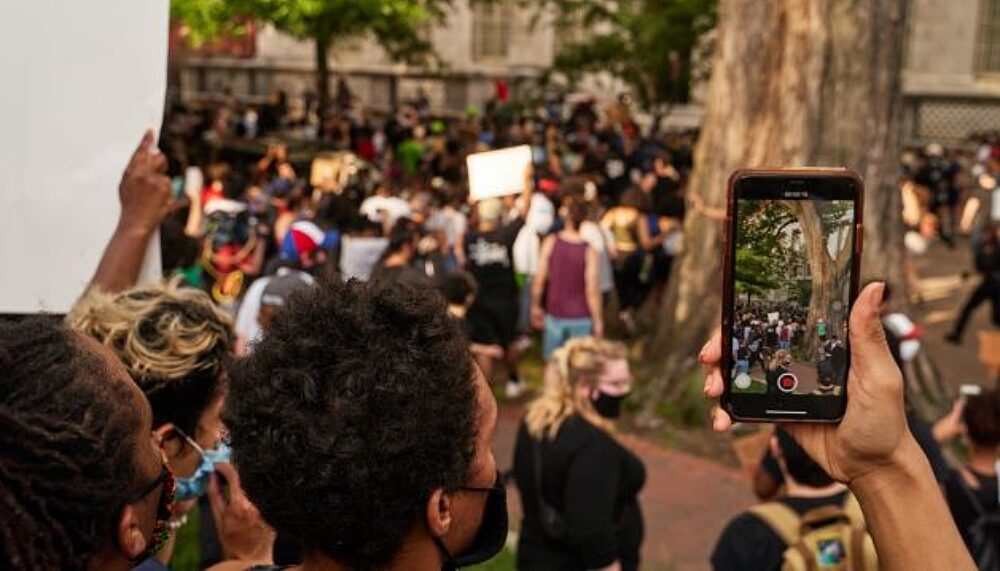 Protesters recording demonstrations in Washington, DC / United States on May 29 2020