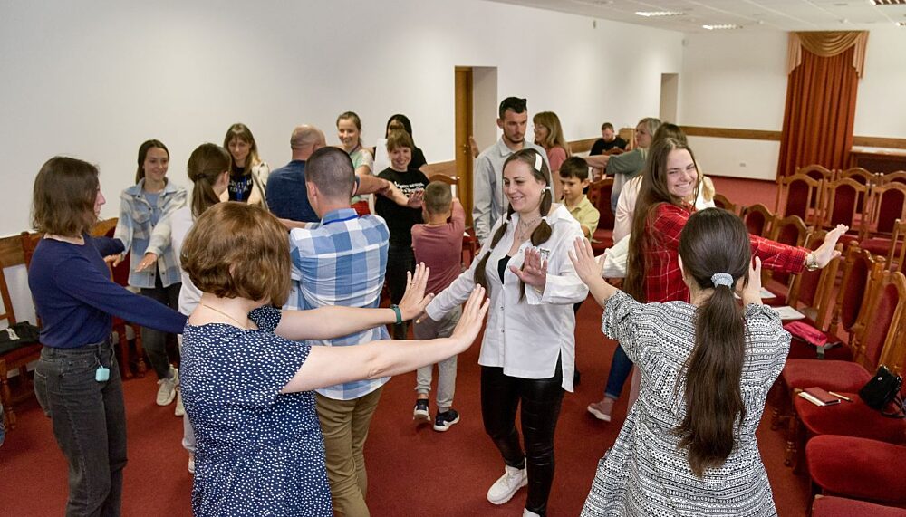 Participants of the interfaith rehabilitation programme "Restart" at a session called “Making connections – expressing solidarity".