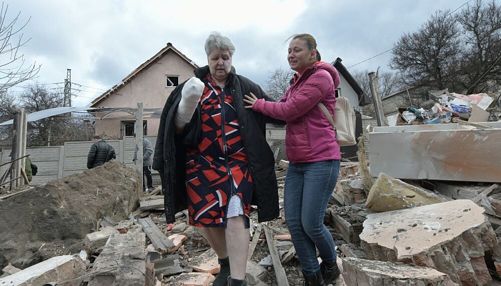 Two Ukrainian women after shelling in Donetsk, Ukraine in March 2023.