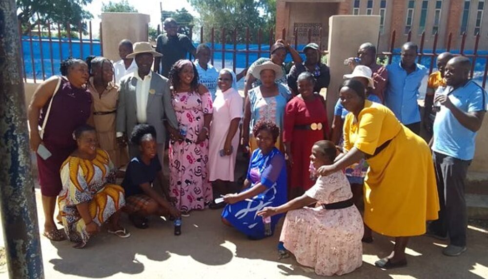 Our insider mediators in Chiadzwa after discussing how farmers and miners can share land in a sustainable way that benefits everyone at a stakeholder consultation meeting.