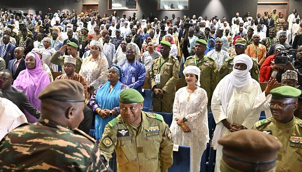 President of the National Council for the Safeguard of the Homeland (CNSP) General Tiani greets participants of the Assises Nationales, a National Dialogue event organised by the military junta.