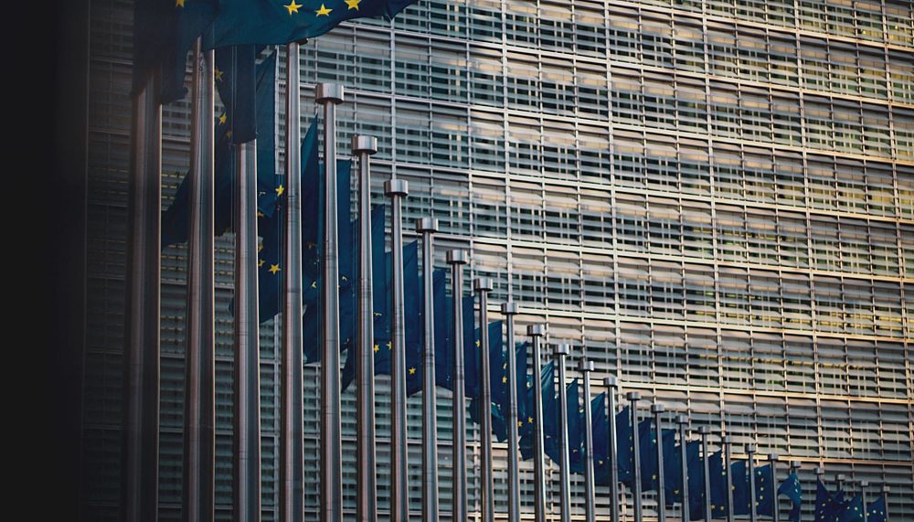 Flags of the member states of the European Union in front of the EU-commission building "Berlaymont" in Brussels, Belgium