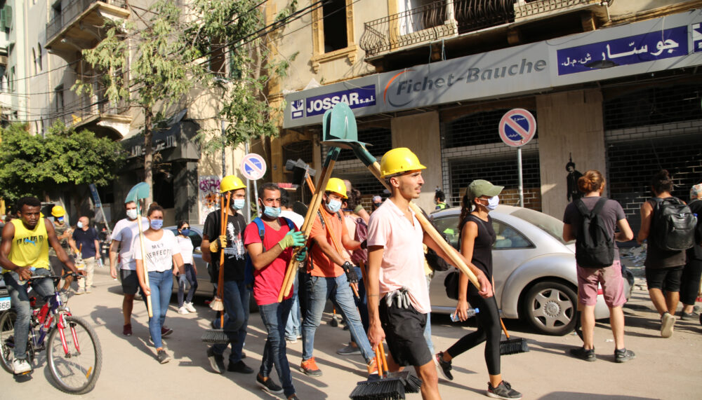 Volunteers cleaning up in downtown Beirut after the explosion in the port of Beirut in August 2020.